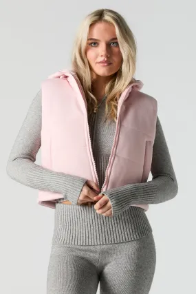 Gilet bouffant à capuchon en laine polaire